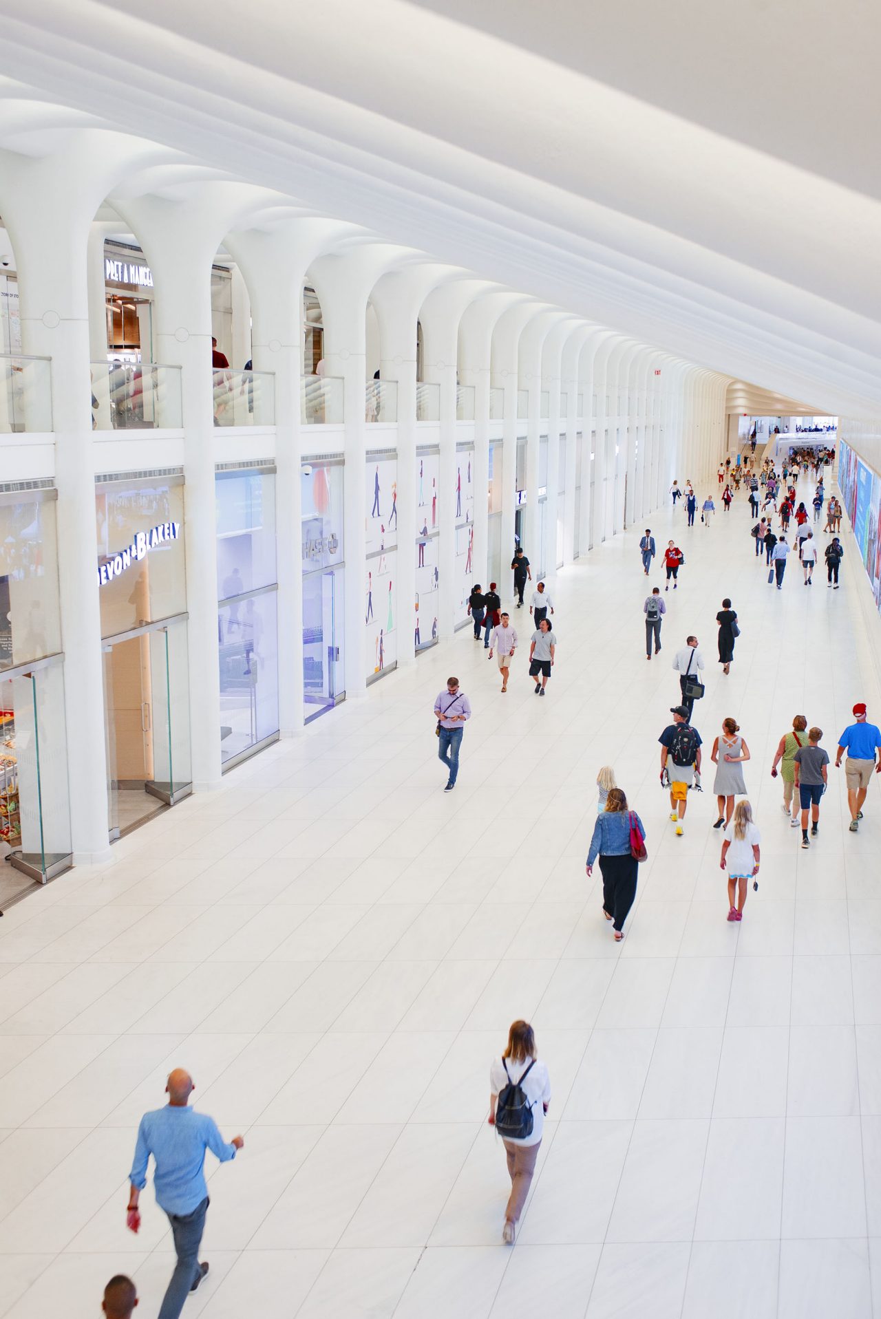 Custoemrs walking through the West Concourse of the Oculus at the World Trade Center